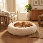 Pouncie CloudNest soothing plush round dog bed with a happy pet at home