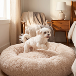 Pouncie CloudNest soothing plush round dog bed with a pet in a cozy home
