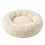 Pouncie CloudNest soothing plush round dog bed on a white background